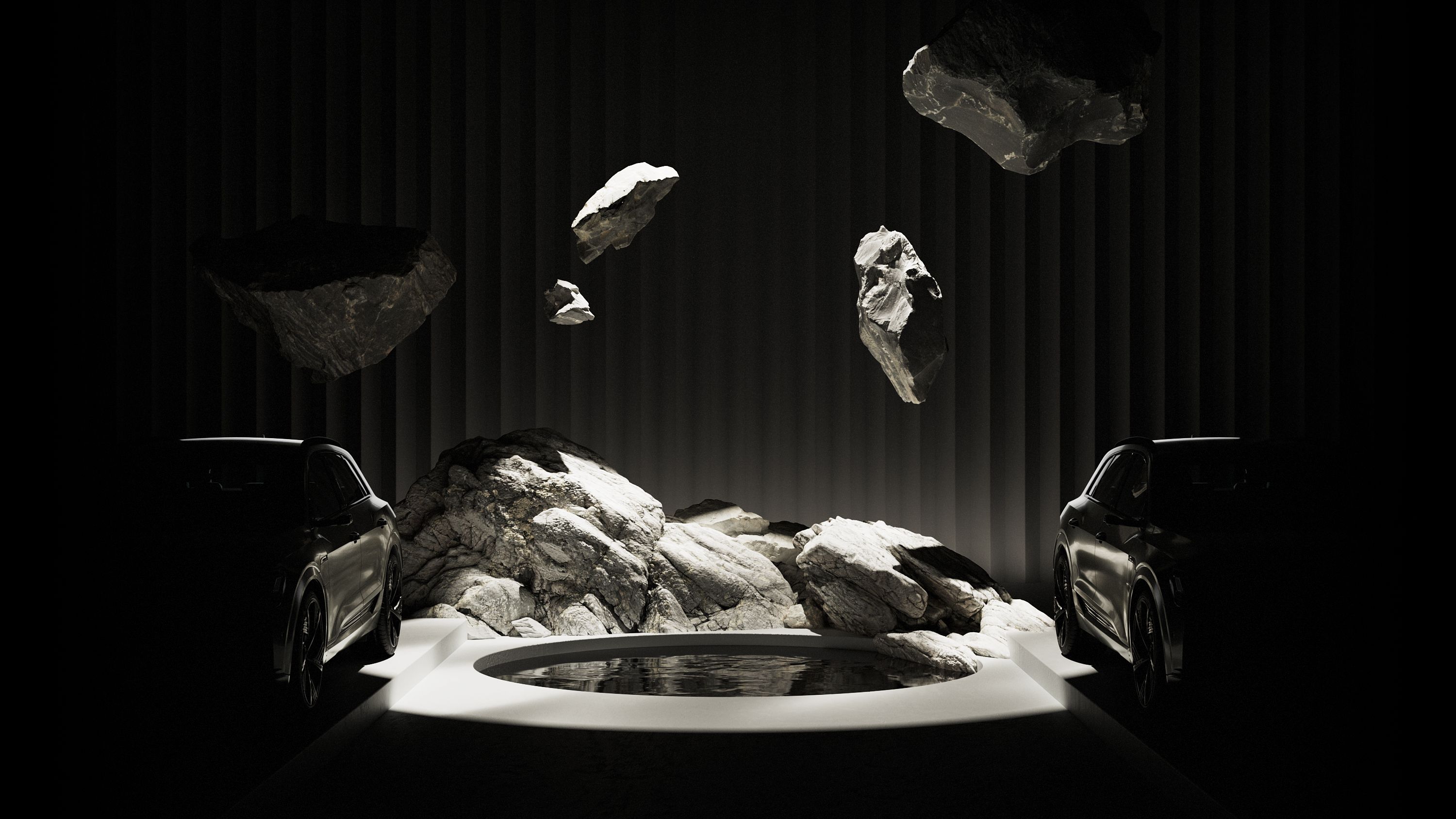 Leteči balvani med dvema avtomobiloma